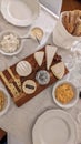 Assortment of cheese on a wooden board