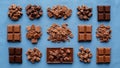 An assortment of chocolate pieces and bars is arranged on a blue Royalty Free Stock Photo