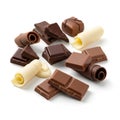 Assortment of chocolate pieces and curls on a white background Royalty Free Stock Photo