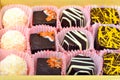 Assortment of chocolate sweets on bamboo mat