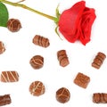 Assortment of chocolates and red rose isolated on white . Flat l Royalty Free Stock Photo