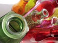 assortment of colorful bottles and reflections.. Dig deep Royalty Free Stock Photo