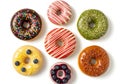 An assortment of colorful donuts displayed on a white Royalty Free Stock Photo