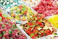 Assortment colorful gummy candies at market selective focus