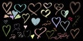 Assortment of colorful hand drawn hearts featuring various sketchy outlines scribbles and different pastel shades against a solid Royalty Free Stock Photo