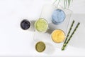 Assortment of colorful Japanese tea latte with milk, green, blue, pink moon milk, golden milk. Fashionable healthy drink has anti-