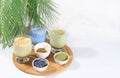 Assortment of colorful Japanese tea latte with milk, green, blue, pink moon milk, golden milk. Fashionable healthy drink has anti-