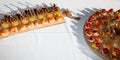 Assortment of colorful petit fours for event wedding reception in white table Royalty Free Stock Photo