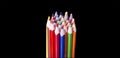 Assortment of coloured pencils on black background Royalty Free Stock Photo