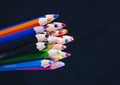 Assortment of coloured pencils on black background Royalty Free Stock Photo