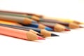 Assortment of coloured pencils on white background