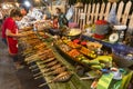 An assortment of cooked Lao food sold from stalls at the popular evening food market in Luang Prabang Laos