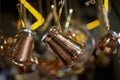 Assortment of copper cezve for making Turkish coffee Royalty Free Stock Photo