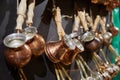 Assortment of copper cezve for making Turkish coffee Royalty Free Stock Photo