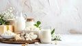 An assortment of dairy products on a light table, various types of cheeses and cottage cheese