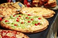 Assortment of delicious Italian pizzas in the restaurant Royalty Free Stock Photo