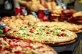 Assortment of delicious Italian pizzas in the restaurant Royalty Free Stock Photo