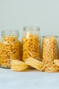 Assortment of different shapes whole grain raw Italian pasta in Royalty Free Stock Photo