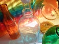 colorful glass bottles and reflections, rainbow Royalty Free Stock Photo