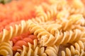 Assortment of different types of gluten-free penne pasta from chickpeas, red lentils, peas