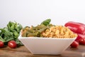 Assortment of different types of gluten-free penne pasta from chickpeas, red lentils, peas