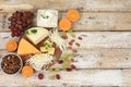 Assortment of different varieties of cheeses, grapes and nuts, fruits, the basis of the French diet, healthy and natural food Royalty Free Stock Photo