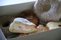 Assortment of donuts in a box for breakfast