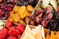 Assortment of dried fruits closeup background in square cells. Royalty Free Stock Photo