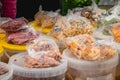 Assortment of dried fruits sold by a shopkeeper