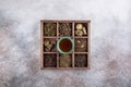 Assortment of dried tea in wooden box. Black and green tea collections. Top view. Copy space Royalty Free Stock Photo