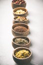 Assortment of dry tea in coconut bowls.