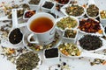 Assortment of dry tea. Various kinds of tea isolated on white.Different kinds of tea leaves. Tea composition with different kind