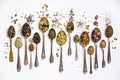 Assortment of dry tea in vintage spoons