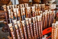 Assortment of duduk for sale on the shelves of the souvenir shop. Traditional Armenian brass musical instrument made of