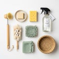 An assortment of eco-friendly cleaning tools is displayed on a white surface. Includes a long-handle Royalty Free Stock Photo