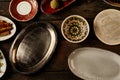 Assortment of empty rustic dishes on a table Royalty Free Stock Photo