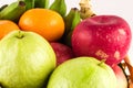 Assortment of exotic fruits  guava and orange and red apple on  background fruit health food Royalty Free Stock Photo