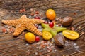 Assortment of exotic fruits, nuts and starfish Royalty Free Stock Photo