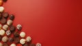 Assortment of fine chocolate candies, white, dark, and milk chocolate Sweets on red background. Royalty Free Stock Photo