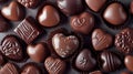 Assortment of fine chocolates in heart shapes with elegant designs Royalty Free Stock Photo