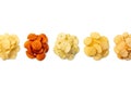 Assortment of Five Piles of Potato Chips on White Background Royalty Free Stock Photo