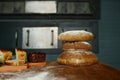 Assortment of fresh baked bread on wooden table of bakery house Royalty Free Stock Photo