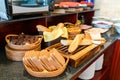 Assortment of fresh bread on table in buffet Royalty Free Stock Photo