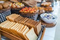 Assortment of fresh bread on table in buffet Royalty Free Stock Photo