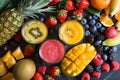 Assortment of fresh, colorful fruits and smoothies Royalty Free Stock Photo
