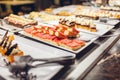 Assortment of fresh desserts displayed in hotel buffet. Variety of cakes in canteen ready for dinner Royalty Free Stock Photo