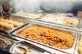 Assortment of fresh dishes displayed in hotel buffet. Variety of food in canteen ready for dinner Royalty Free Stock Photo