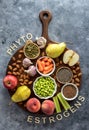 An assortment of fresh foods high in phytoestrogens against a blue background. Royalty Free Stock Photo