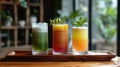 Assortment of fresh fruit juices in clear glasses on rustic wooden tray, healthy drinks concept Royalty Free Stock Photo