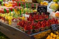 Fresh fruits served in take-away cups at la Boqueria market in Barcelona Royalty Free Stock Photo